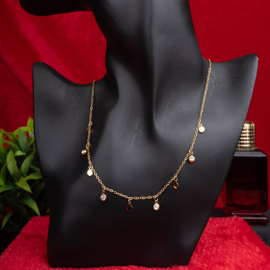 Gold necklace with alternating discs and crystals - Revaaj