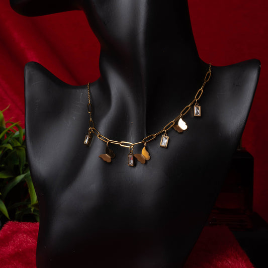 Gold link necklace with butterfly and rectangular crystal charms - Revaaj
