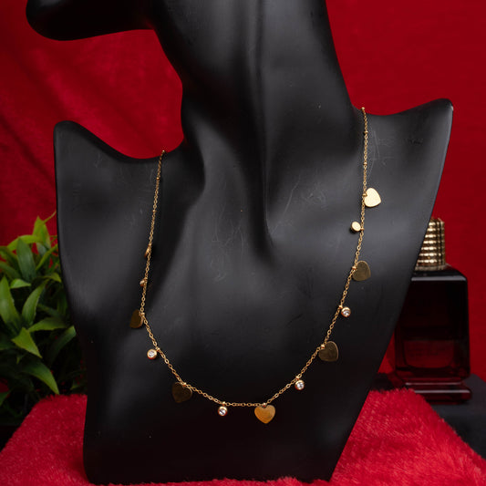 Gold necklace with alternating heart charms and crystals - Revaaj