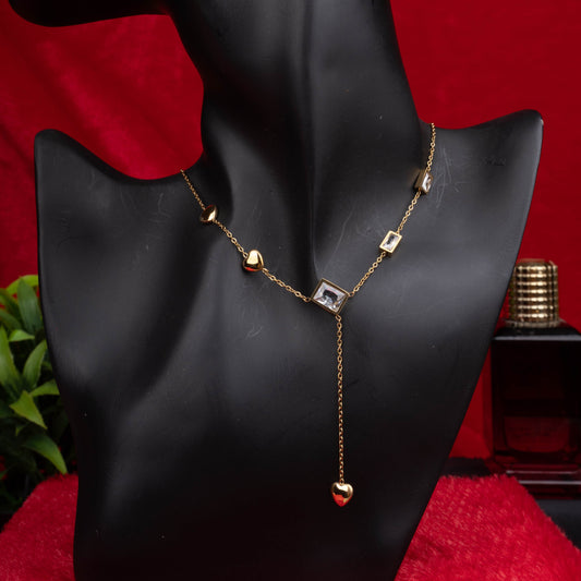 Gold necklace with red rectangular gemstones and heart charms - Revaaj