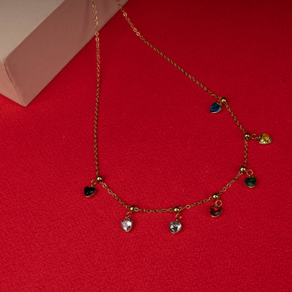 Gold necklace with multicolor heart crystal charms floored image - Revaaj