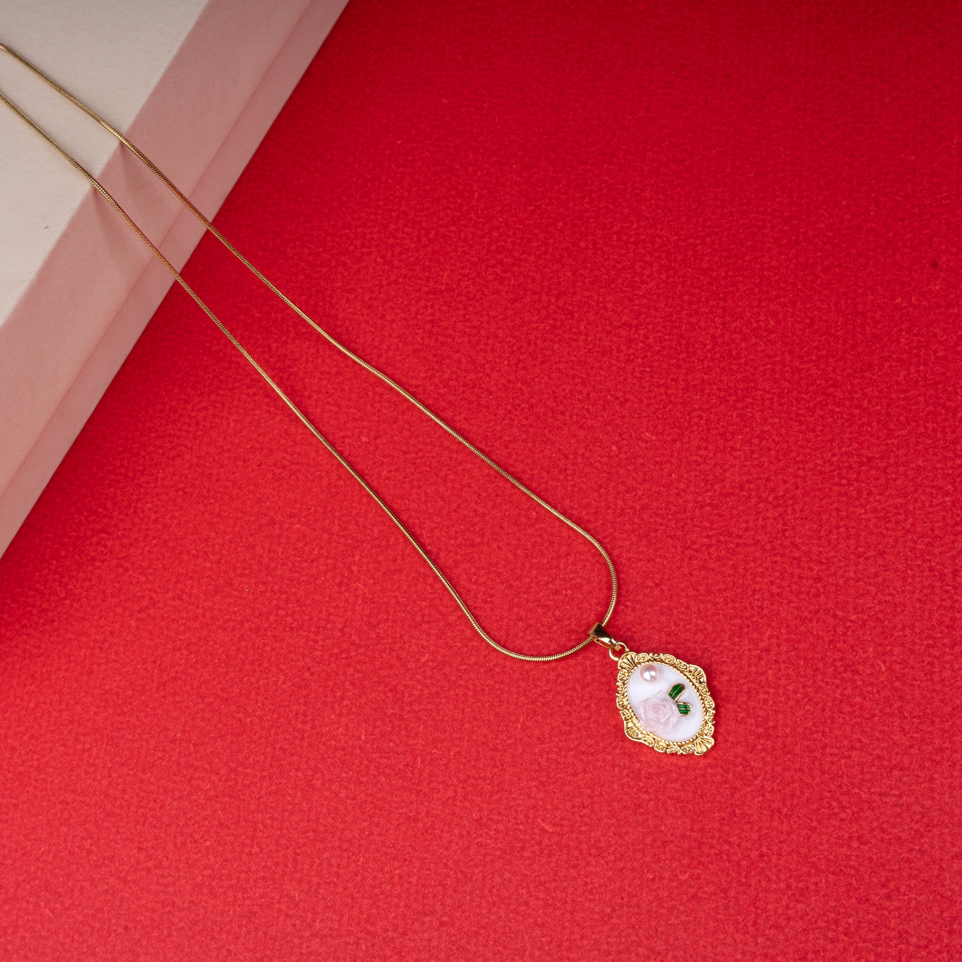Vintage rose portrait pendant necklace with gold-tone snake chain floored image - Revaaj