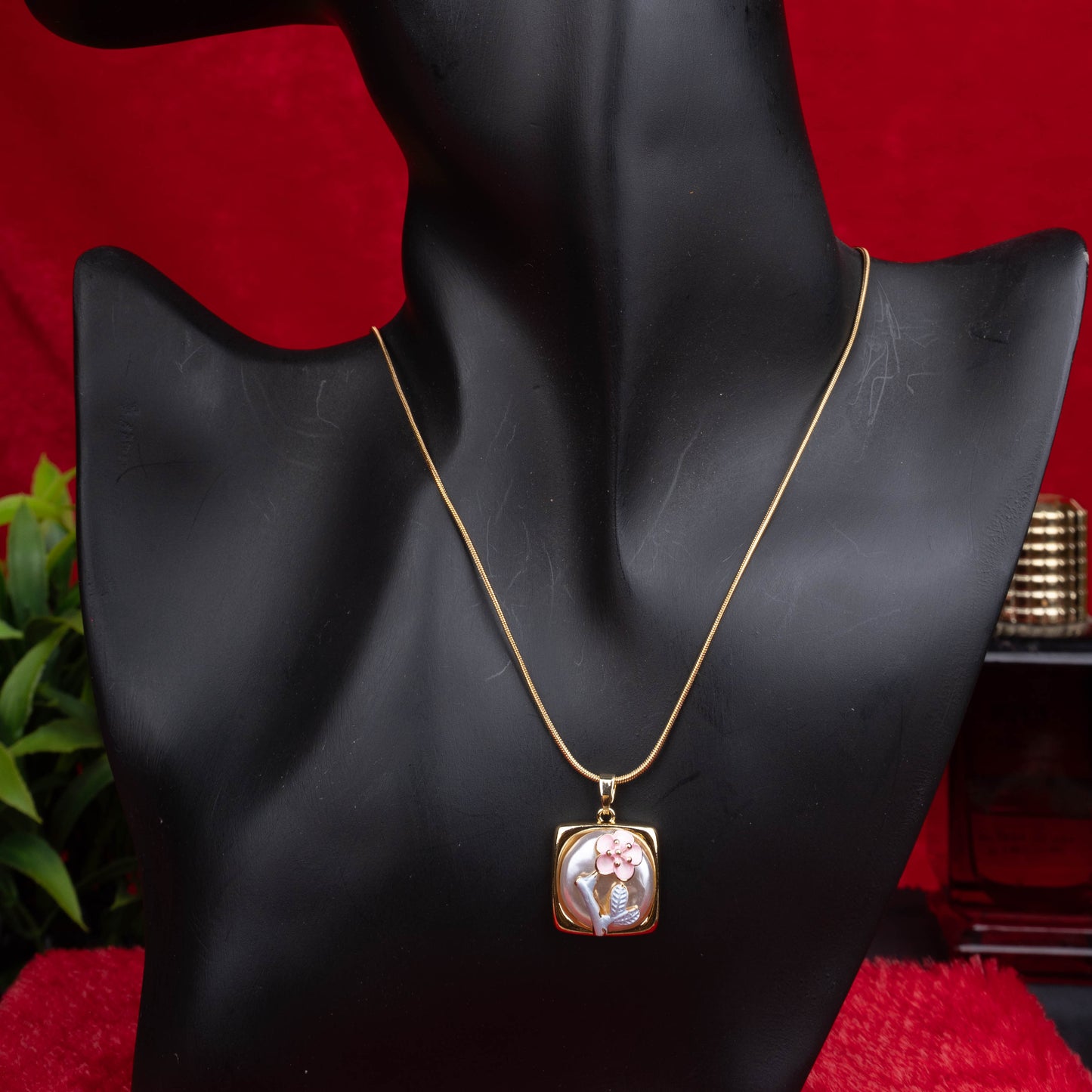 Gold floral mother-of-pearl pendant necklace with pink flower design - Revaaj