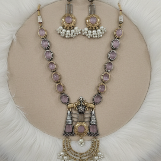 Antique gold and oxidized silver necklace set with lavender stones and pearl drops by Revaaj Jewellery