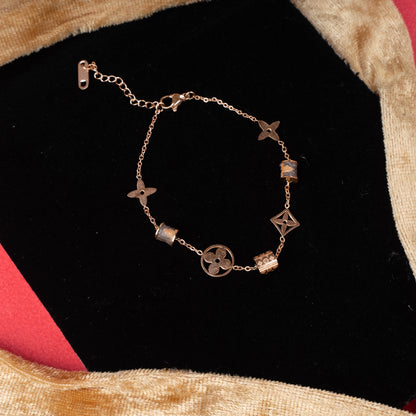 Premium bracelet with floral and geometric charms second view - Revaaj